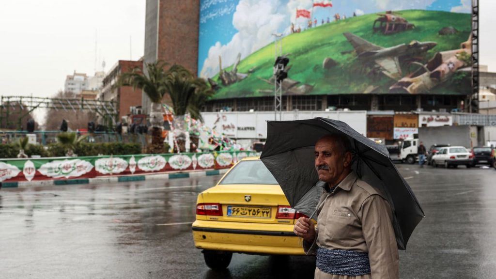 Iran Red Crescent warns residents to stay indoors during black rain Tehran 2026